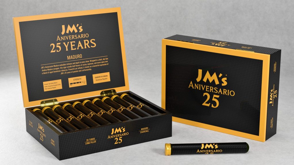 Open and closed boxes of JM’s Aniversario 25 Years Maduro cigars displayed with black cigar tubos, showing the anniversary branding on a neutral background.