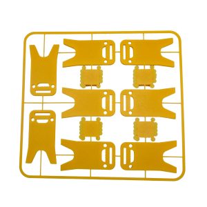 Bright yellow 3D printed cigar holder styled like a classic wet floor caution sign, printed with humorous cigar-related phrases in black text. The foldable design allows the sign to stand upright and serve as a portable cigar rest that keeps cigars elevated and off tables.