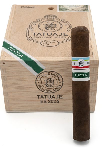 Box of Tatuaje Cigars. Leaning up against the box is a cigar with a band that reads Tuxtla